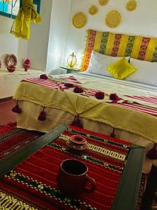 Postel nebo postele na pokoji v ubytování Riad rajad Marrakech