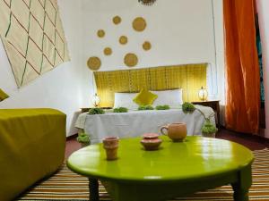 Postel nebo postele na pokoji v ubytování Riad rajad Marrakech