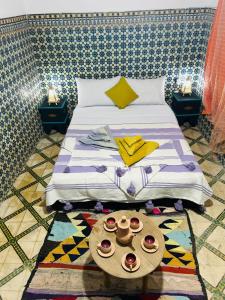 Postel nebo postele na pokoji v ubytování Riad rajad Marrakech
