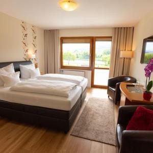 Postel nebo postele na pokoji v ubytování Hotel Zehnthof