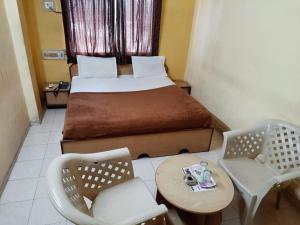 Postel nebo postele na pokoji v ubytování Hotel Ten