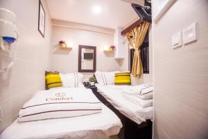 Letto o letti in una camera di Comfort Guest House - C and E