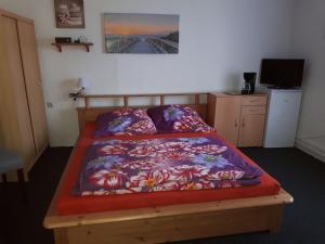 Postel nebo postele na pokoji v ubytování Haus Ebel