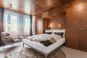 Postel nebo postele na pokoji v ubytování EMA House Hotel Suites + 36 fotografií
