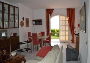 a living room with a couch and a table at Villa Gioia in Ischia