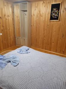 Postel nebo postele na pokoji v ubytování микуличин на долоні
