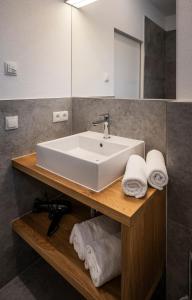 Ένα μπάνιο στο Zeitlos Apartments Flachau