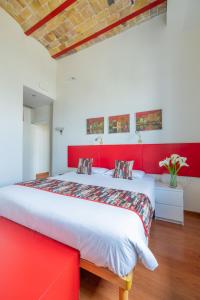 A bed or beds in a room at Superior Relais FCollection Temple View