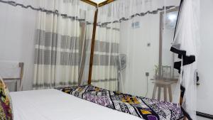 Postel nebo postele na pokoji v ubytování Namal Homestay Sigiriya
