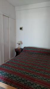 Ένα ή περισσότερα κρεβάτια σε δωμάτιο στο Disfrutar