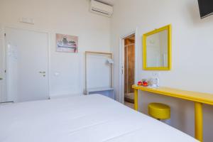 A bed or beds in a room at Superior Relais FCollection Temple View