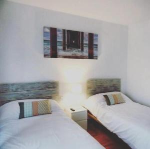 Кровать или кровати в номере Aloka rooms Sopela