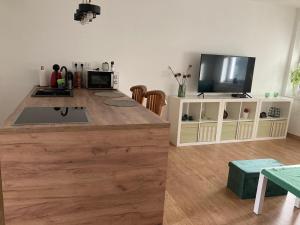 Kuchyňa alebo kuchynka v ubytovaní Apartament przy samym jeziorze