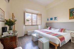 A bed or beds in a room at Superior Relais FCollection Temple View