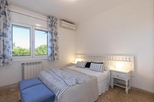 Postel nebo postele na pokoji v ubytování UHC Cye Apartments