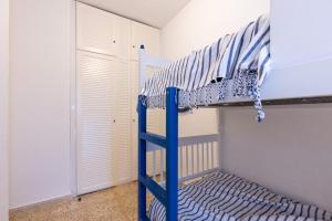 Postel nebo postele na pokoji v ubytování UHC Cye Apartments