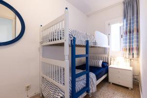 Postel nebo postele na pokoji v ubytování UHC Cye Apartments