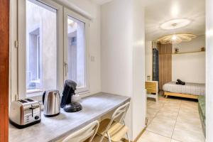 Una cocina o cocineta en El boulangerie - Central - Wifi