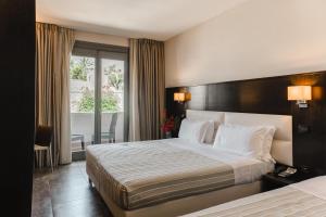 Basiliani - CDSHotels客房内的一张或多张床位