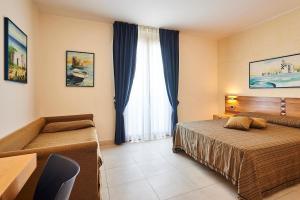 Postel nebo postele na pokoji v ubytování Costa del Salento - CDSHotels