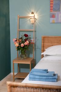 Postel nebo postele na pokoji v ubytování Rosa Tea B&B