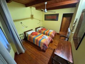 Postel nebo postele na pokoji v ubytování B&B Muggianeddu
