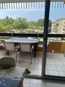 Balkón alebo terasa v ubytovaní SOPRALAND Joli T2 avec cabine piscine proche plage Richelieu Cap d Agde