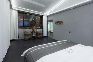 ภาพในคลังภาพของ Xitang Overnight Garden B&B ในเจียซิง