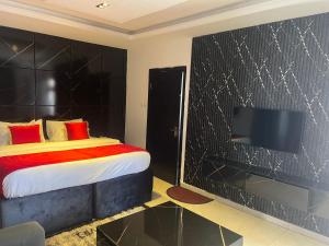 Voodi või voodid majutusasutuse Florence Hotel and suites toas