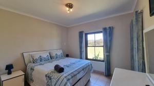 Postel nebo postele na pokoji v ubytování Shelly beach, unit 25 bondi beach + 13 fotografií