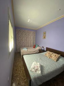 Posteľ alebo postele v izbe v ubytovaní Casa Rural Pariente + 37 fotografií