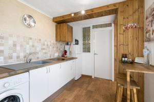 Kuchyň nebo kuchyňský kout v ubytování El Hogar de Ireneo B + 16 fotografií