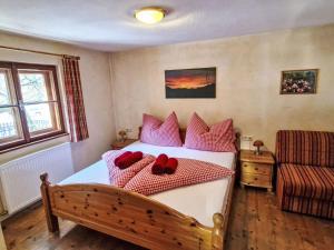 A bed or beds in a room at Apartment Haflingerhof Almrose by Interhome