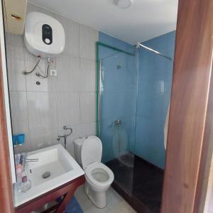 Vannituba majutusasutuses Oia Mindelo Chambre d'hotes