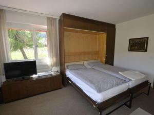 Postel nebo postele na pokoji v ubytování Apartment Triangel A Mohr by Interhome