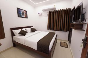 Televisyen dan/atau pusat hiburan di MM Comfort Inn