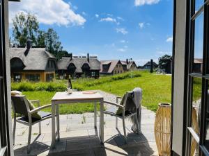 Vườn quanh Ferienhaus Lotta Feriendorf 29 Klein Stresow Rügen by ruyastay