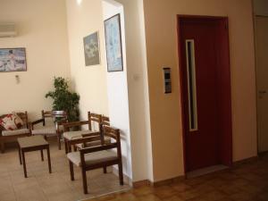 Posezení v ubytování Hotel Inomaos
