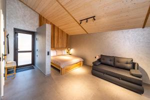 Ліжко або ліжка в номері Апарт- готель SunRay Skhidnytsya