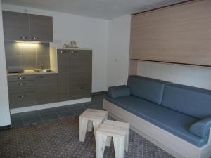 Posezení v ubytování Alpina Appartements + 37 fotografií