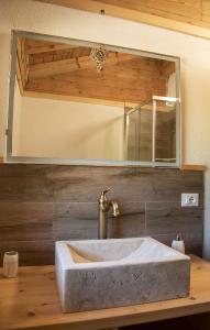 a bathroom with a sink and a mirror at Agriturismo Il Pagliaio in Mercato Saraceno +45 photos