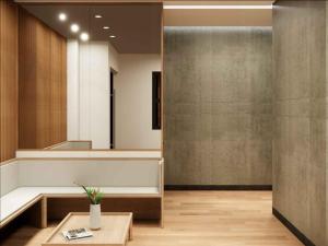 a lobby with a large mirror and a table at Caldwell Boutique Hotel in Legazpi +60 photos