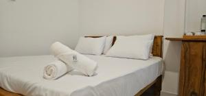 Letto o letti in una camera di VThree Family House