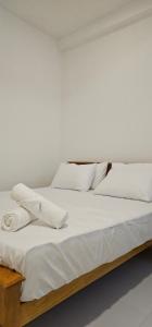 Letto o letti in una camera di VThree Family House