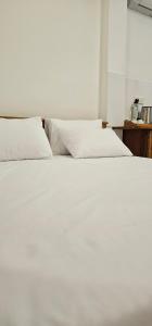 Letto o letti in una camera di VThree Family House