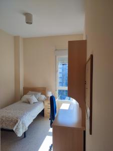 Postel nebo postele na pokoji v ubytování Miresibilbao - Residencia Universitaria