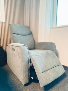 A seating area at F Hotel 24h Check-In