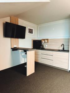 A kitchen or kitchenette at F Hotel 24h Check-In