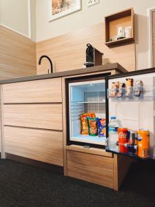 A kitchen or kitchenette at F Hotel 24h Check-In