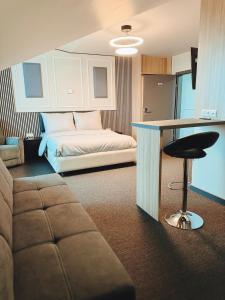 A bed or beds in a room at F Hotel 24h Check-In